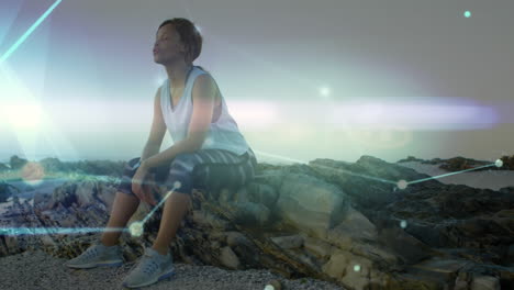 animation of glowing communication network over woman resting after exercise on sitting coast