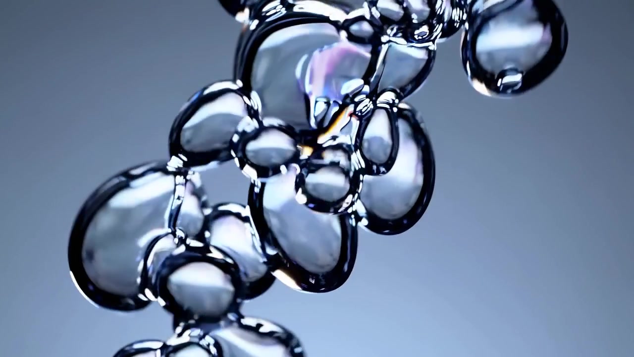 Sfere astratte di metallo liquido che fluttuano e si fondono al rallentatore