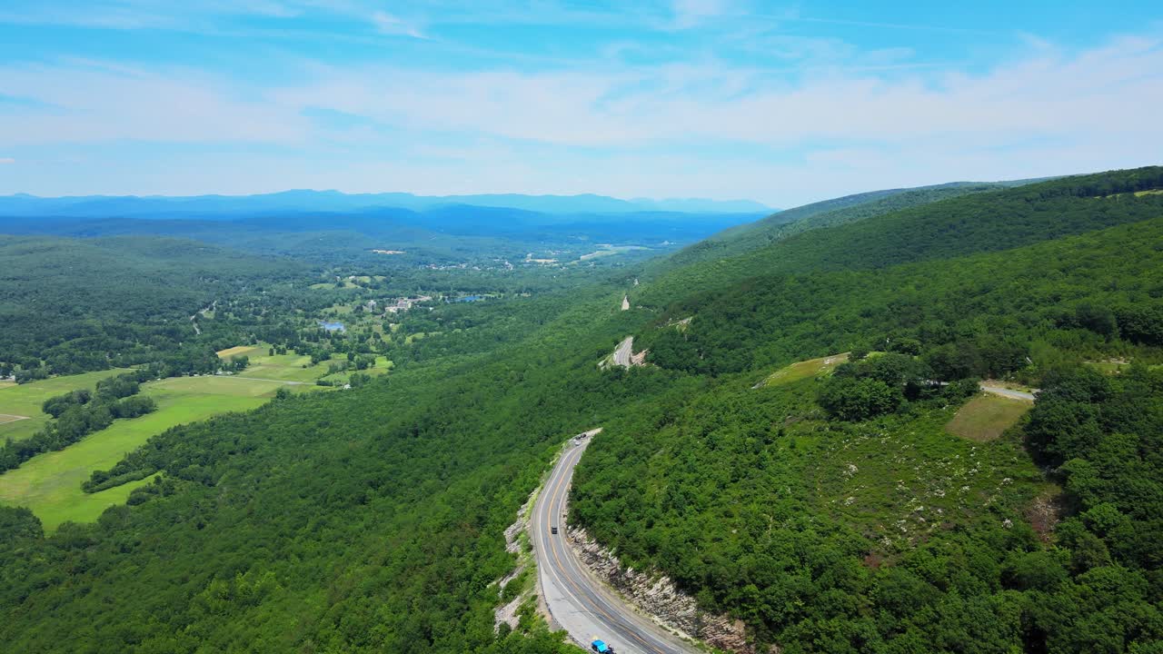 Aerial drone video footage of a scenic mountain highway byway in the Appalachian Mountains. This is in the Shawangunk Mountain sub-range in new york’s Hudson valley during summer time.