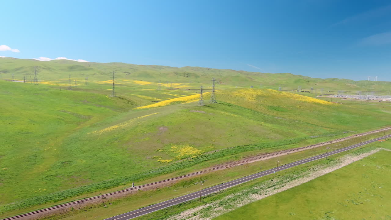 An abundance of spring rain results in wildflowers in California's grasslands - aerial
