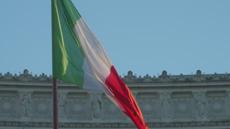 italian flag at monumento vittorio emanuele ii waving in slow motion