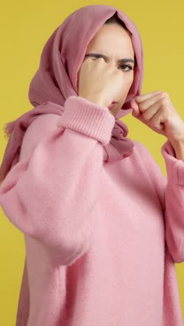 woman in hijab in fighting stance