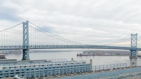 Benjamin-Franklin-Bridge-on-an-overcast-day-in-2020-without-traffic-due-to-curfew-preventing-covid-19-spread