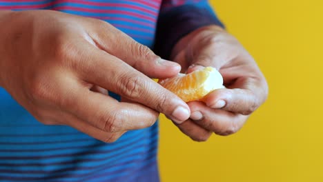 close up of eating orange fruit