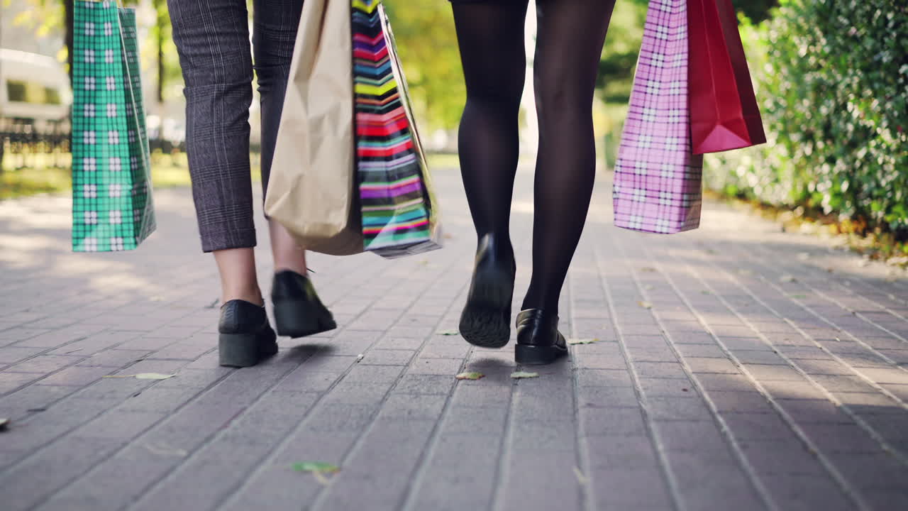 Women Walking with Shopping Bags