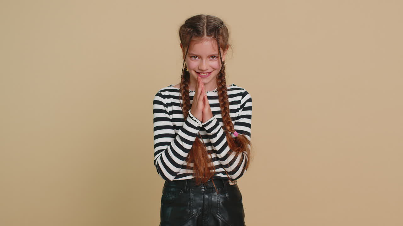 Sneaky cunning child girl kid thinking over devious villain idea cheats jokes pranks evil plan