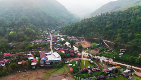 sapan village in mueang nan district, thailand aerial view rice field and mountains landscape