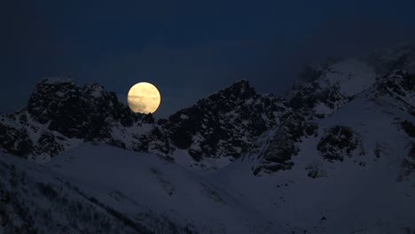 watching a very amazing full moon set, norway