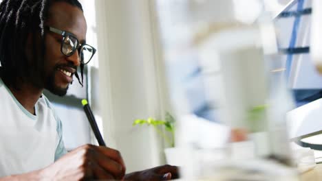 graphic designer using graphics tablet