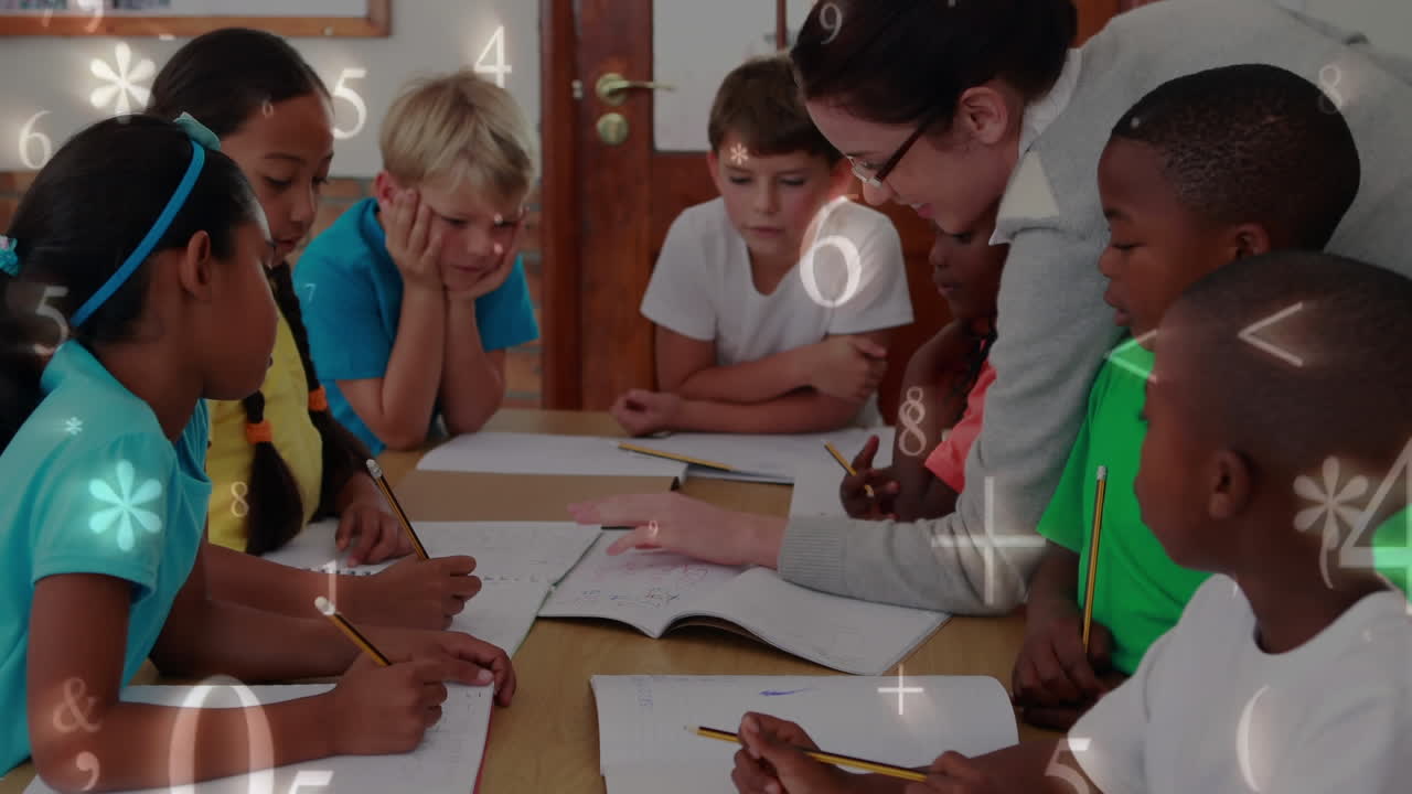 Preschool teacher looking at smart child learning to write and draw