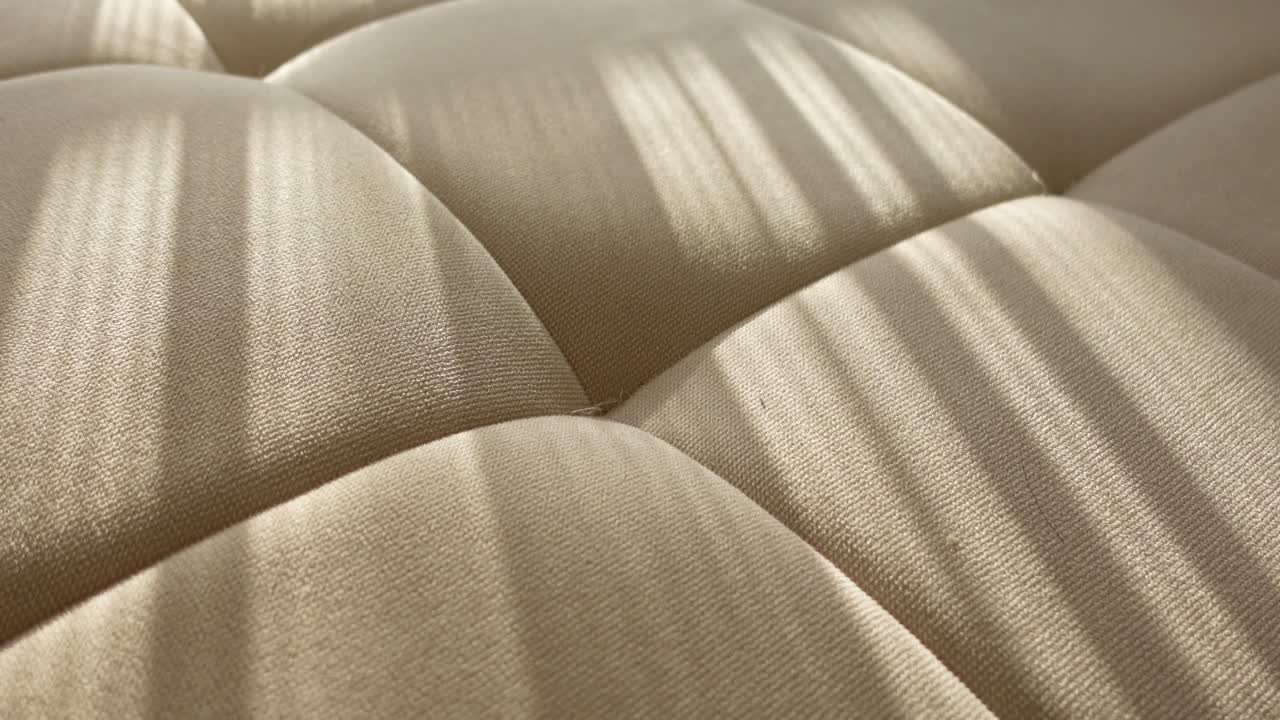 Close-up of Quilted Beige Fabric