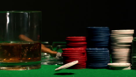 white chip falling and bouncing on casino table