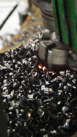 close-up of metal shavings and sparks from machining