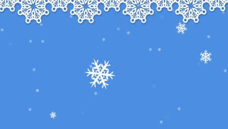 animation of snow falling over christmas decorations on blue background