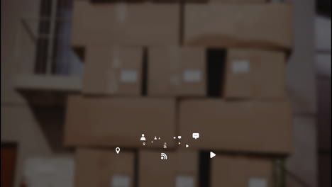 stacked cardboard boxes with animation of social media icons in foreground