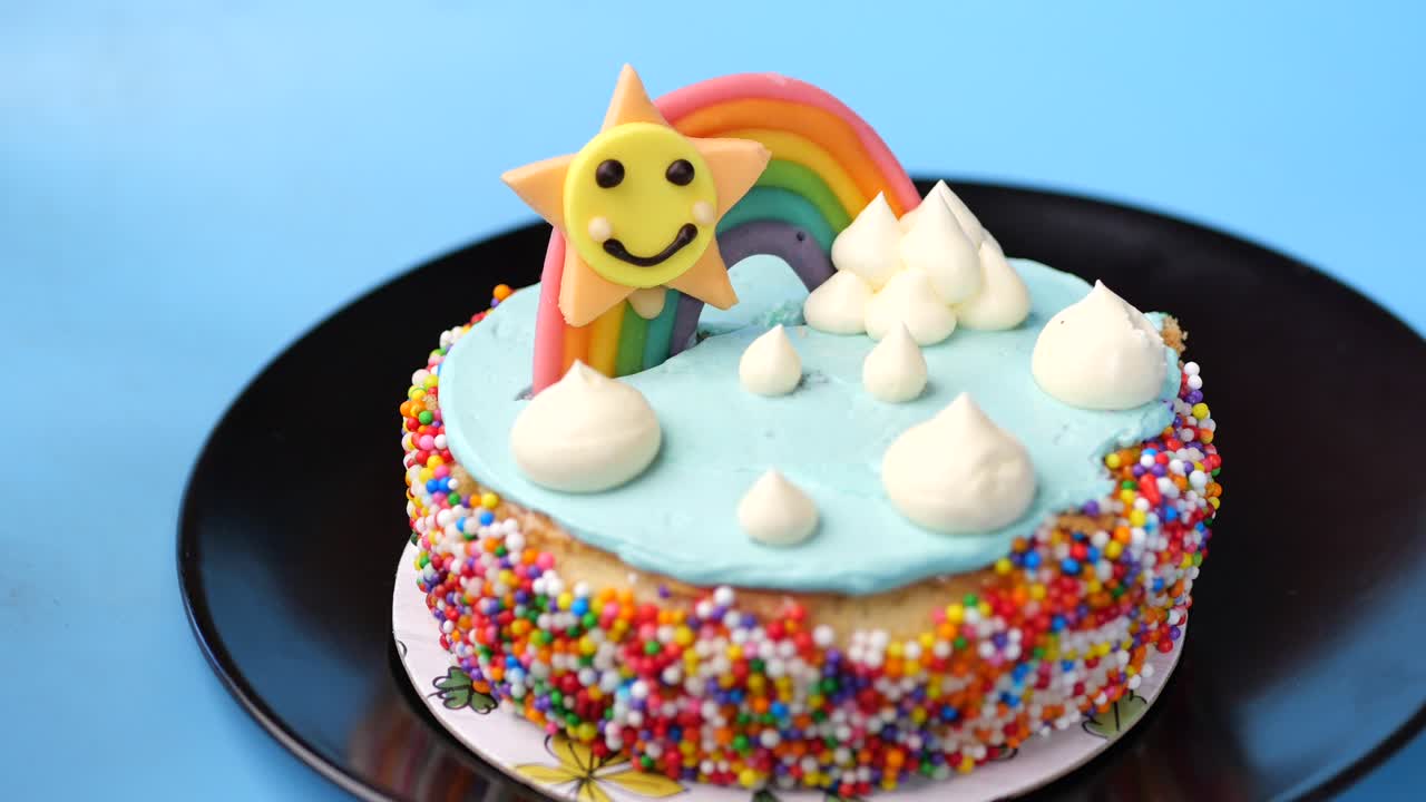 특별한 경우를 위해 귀여운 무지개 케이크