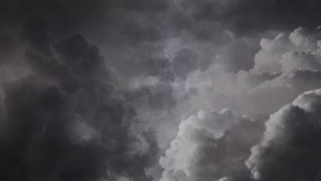 View-of-dark-clouds-and-thunderstorm-inside-dark-sky