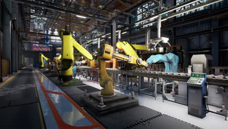 robotic arms working on an assembly line in a factory