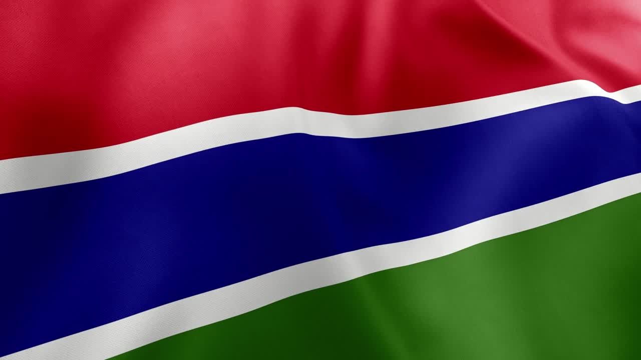 Realistic waving flag of The Gambia, red, blue, green horizontal stripes, white fimbriation. West African nation symbol, Banjul, patriotism, Gambia