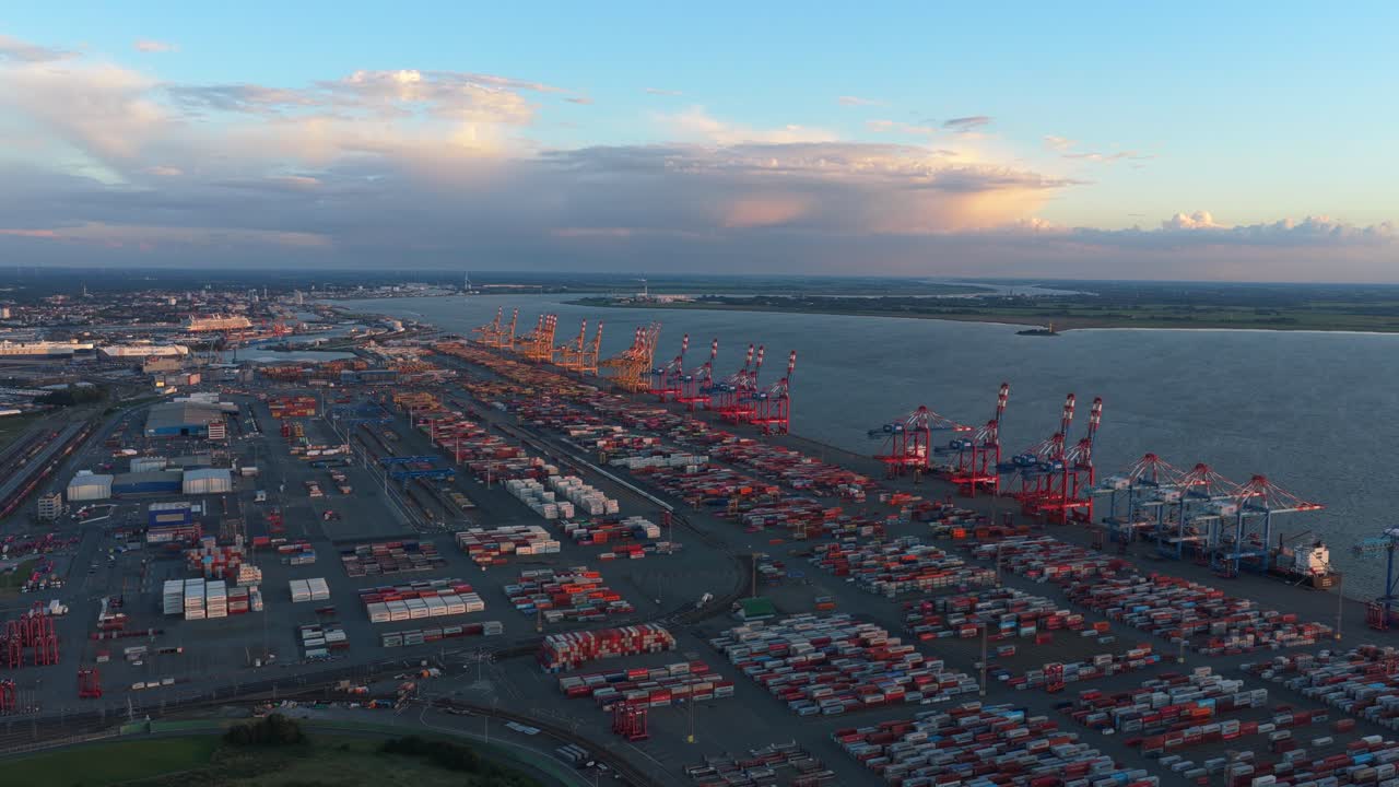 Aerial view of a busy container terminal at dusk