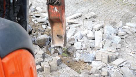 roadwork with jackhammer and paving removal