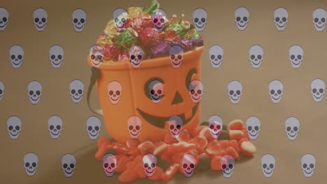 animation of skull icons over halloween box of candy