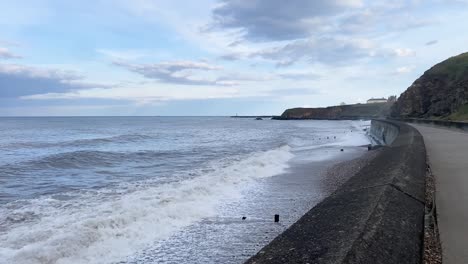 seaham beach with high tide and rough waves on evening