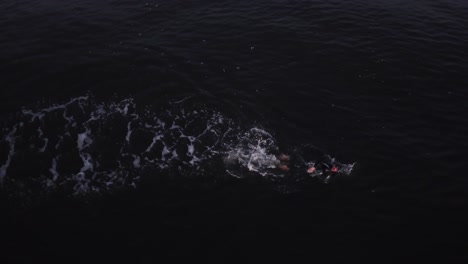 Man-Swimming-In-Ocean-Drone-Overhead