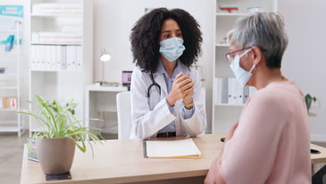 Doctor,-senior-woman-and-talking-with-mask