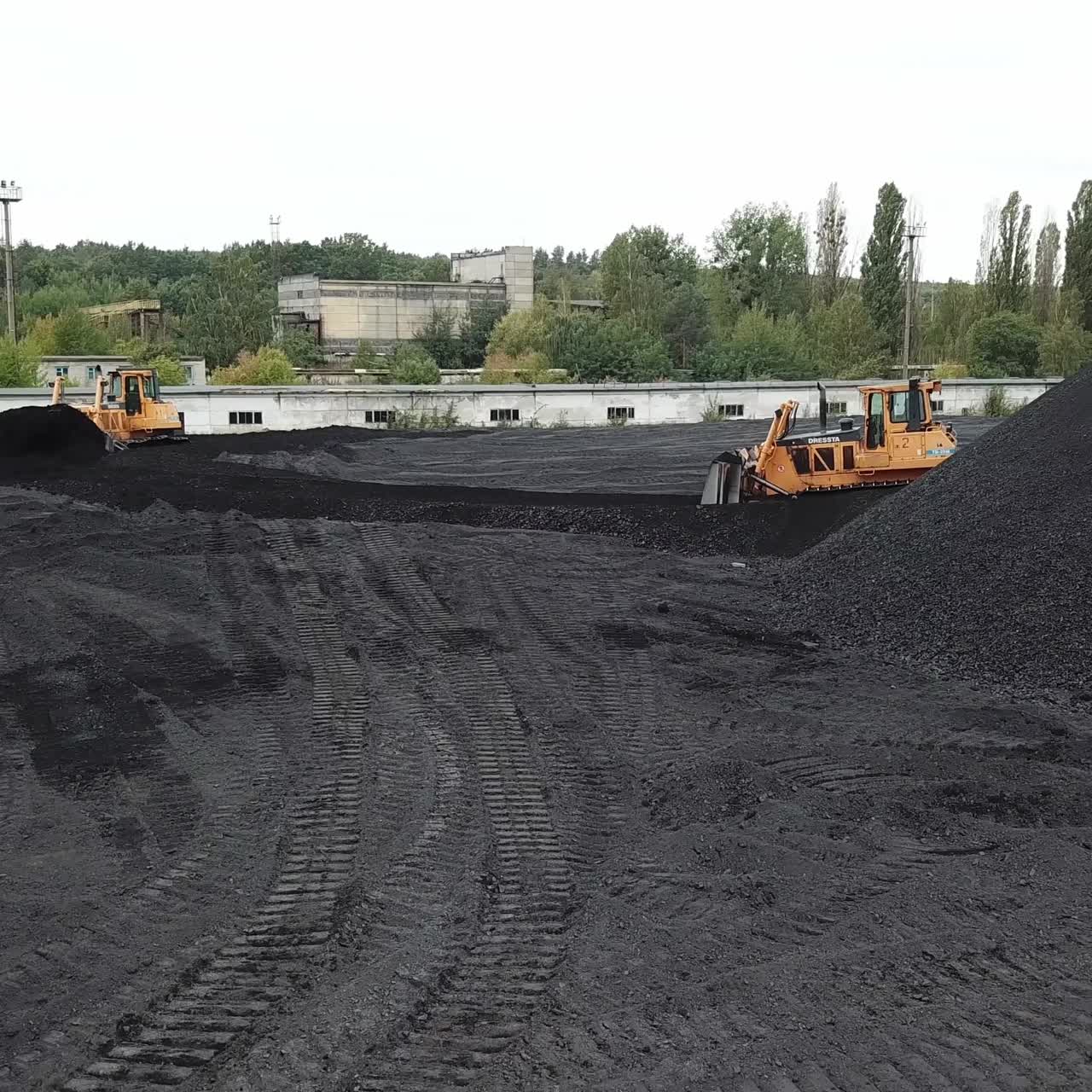 Bulldozer at coal warehouse