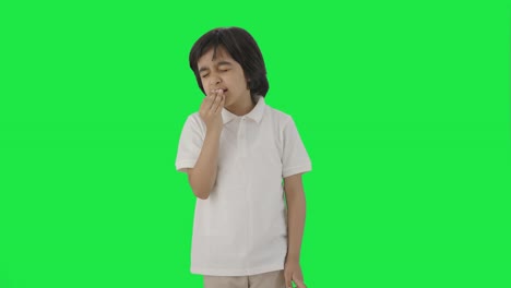 Sick-Indian-boy-suffering-from-cold-and-cough-Green-screen