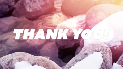 animation of thank you text over stones