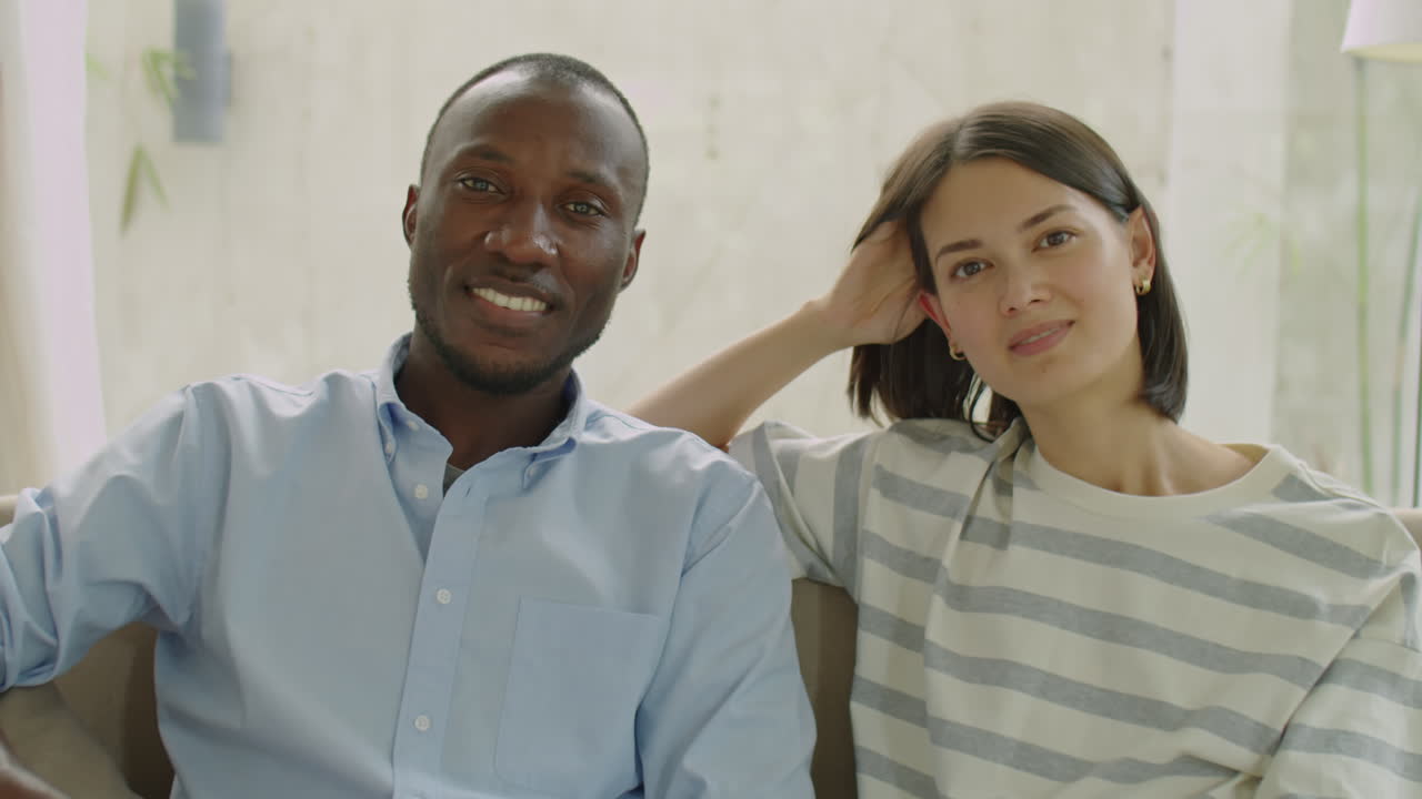 Portrait of Happy Diverse Family Couple at Home