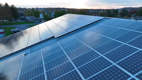 solar panels creating renewable and green energy during sunset