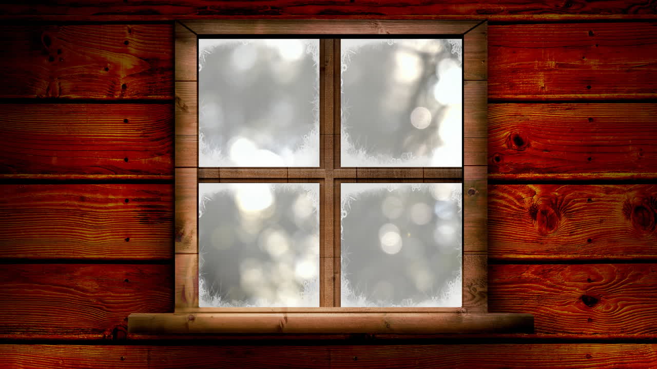 Animation of window over blurred winter landscape at christmas