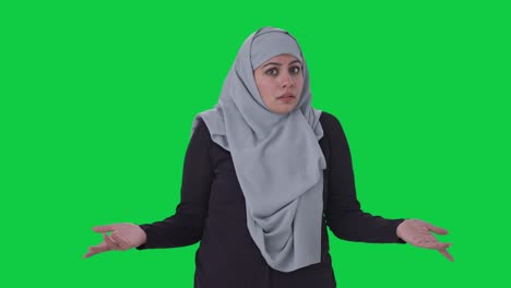 confused muslim woman what question green screen