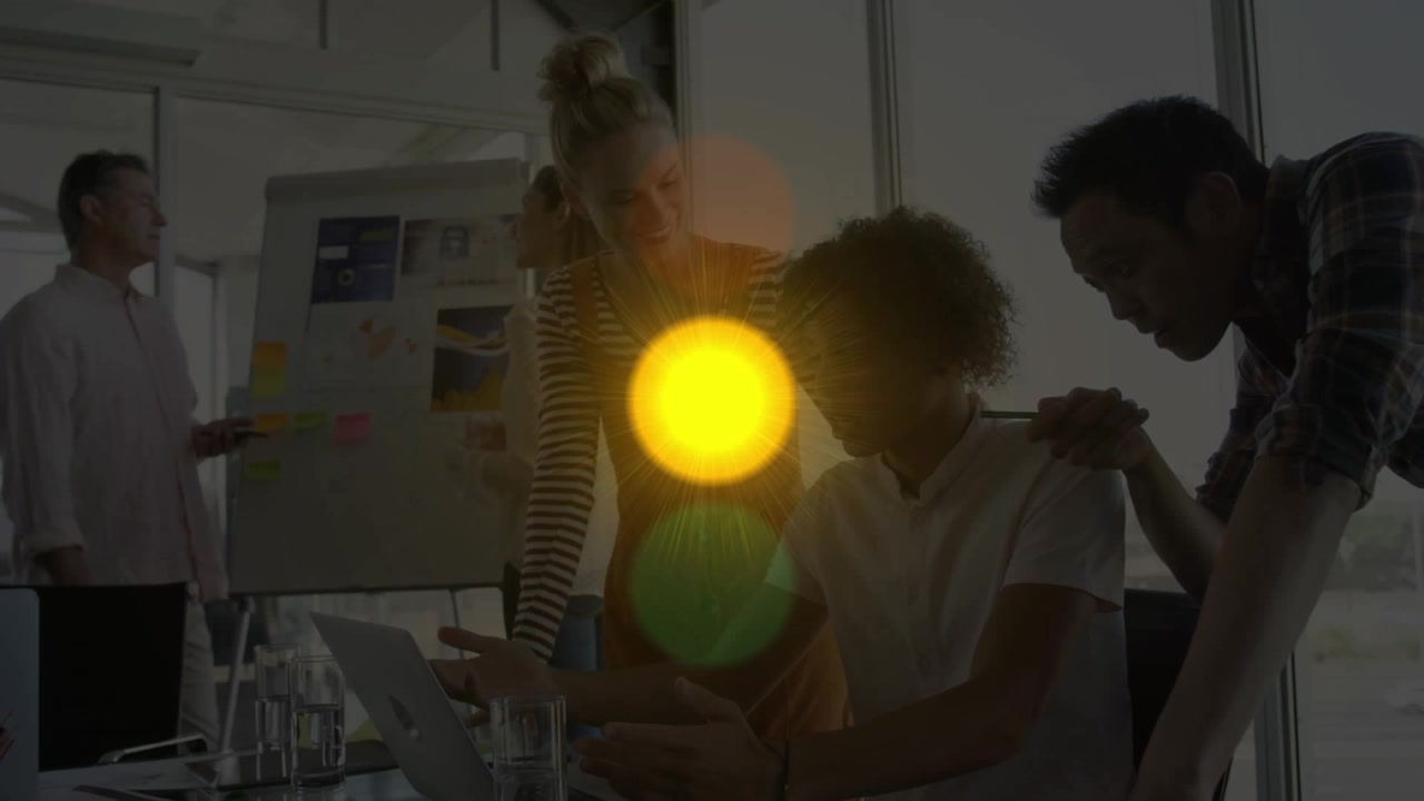 Animation of glowing traffic lights over business people working in office