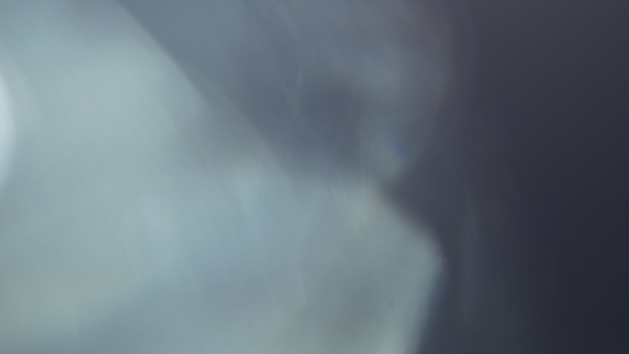 Abstract Light Leaks and Lens Flares on Dark Background