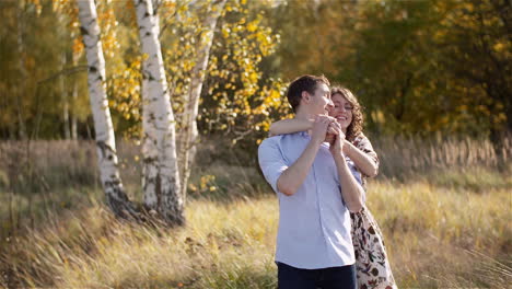 romantic couple enjoying meadow moment