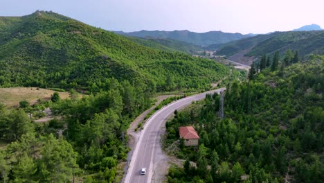 scenic mountain road with winding path and lush forest