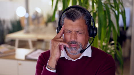 Call-center,-stress-and-headache-by-elderly-man