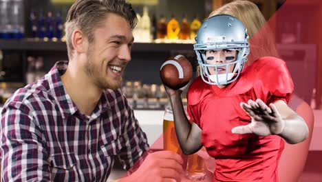 Animation-of-male-american-football-player-over-happy-couple-at-bar