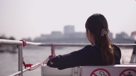 woman on a river boat