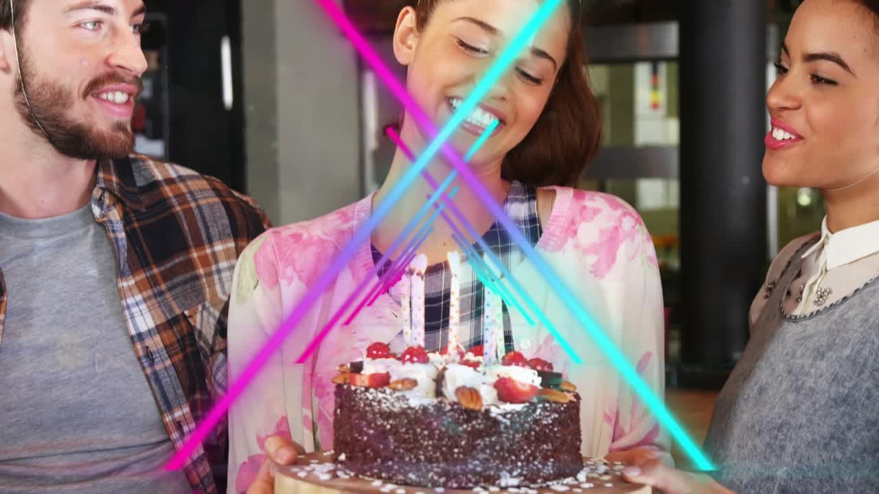 Center woman with cake blowing birthday candles after friend singing, neon streaks crossing faces