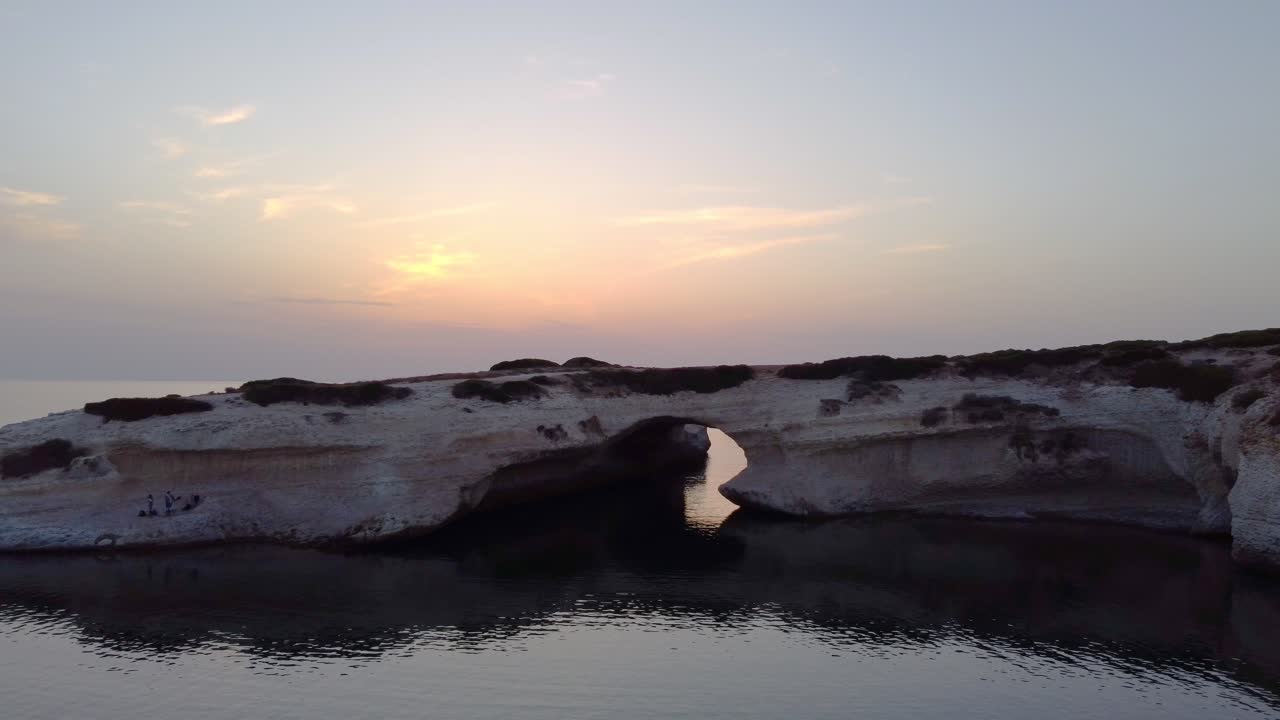 Aerial view of S'archittu in Cuglieri, Sardinia, aerial view, sunset, dolly out