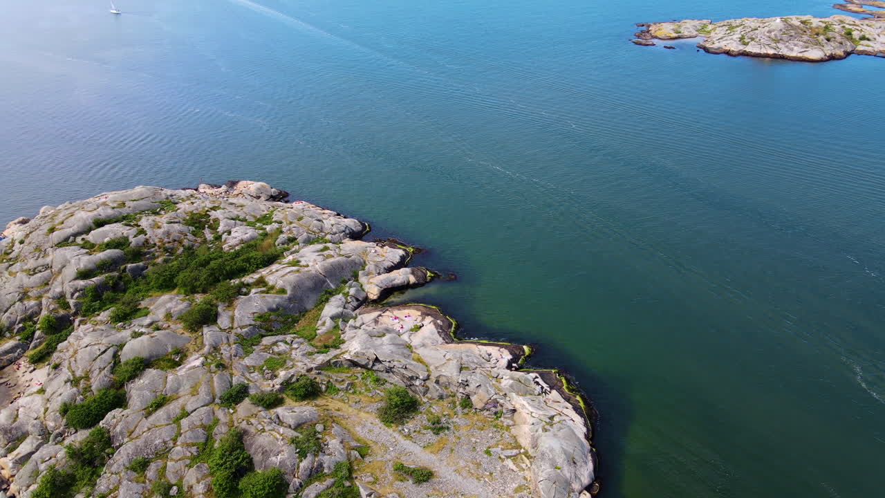 The Wonderful Island In Saltholmen, Gothenburg Surrounded With Deep Blue Ocean During Summer - Aerial Shot