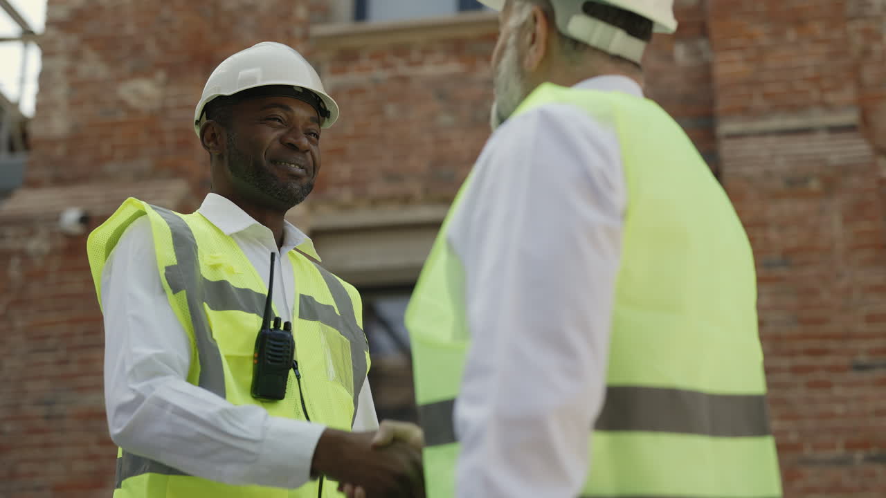 Construction Workers Handshake