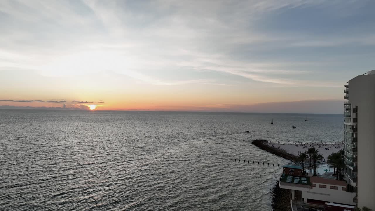 Aerial Clearwater, Florida Sunset, low to high forward