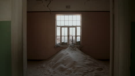abandoned room filled with sand