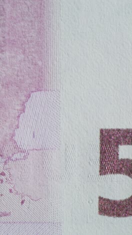 close-up of a pink glitter number zero on tissue paper